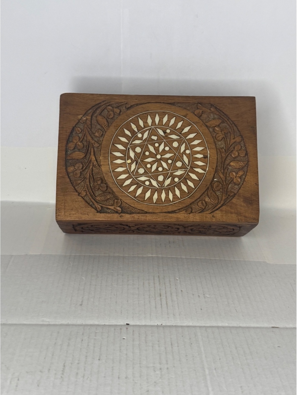 Carved wooden trinket box